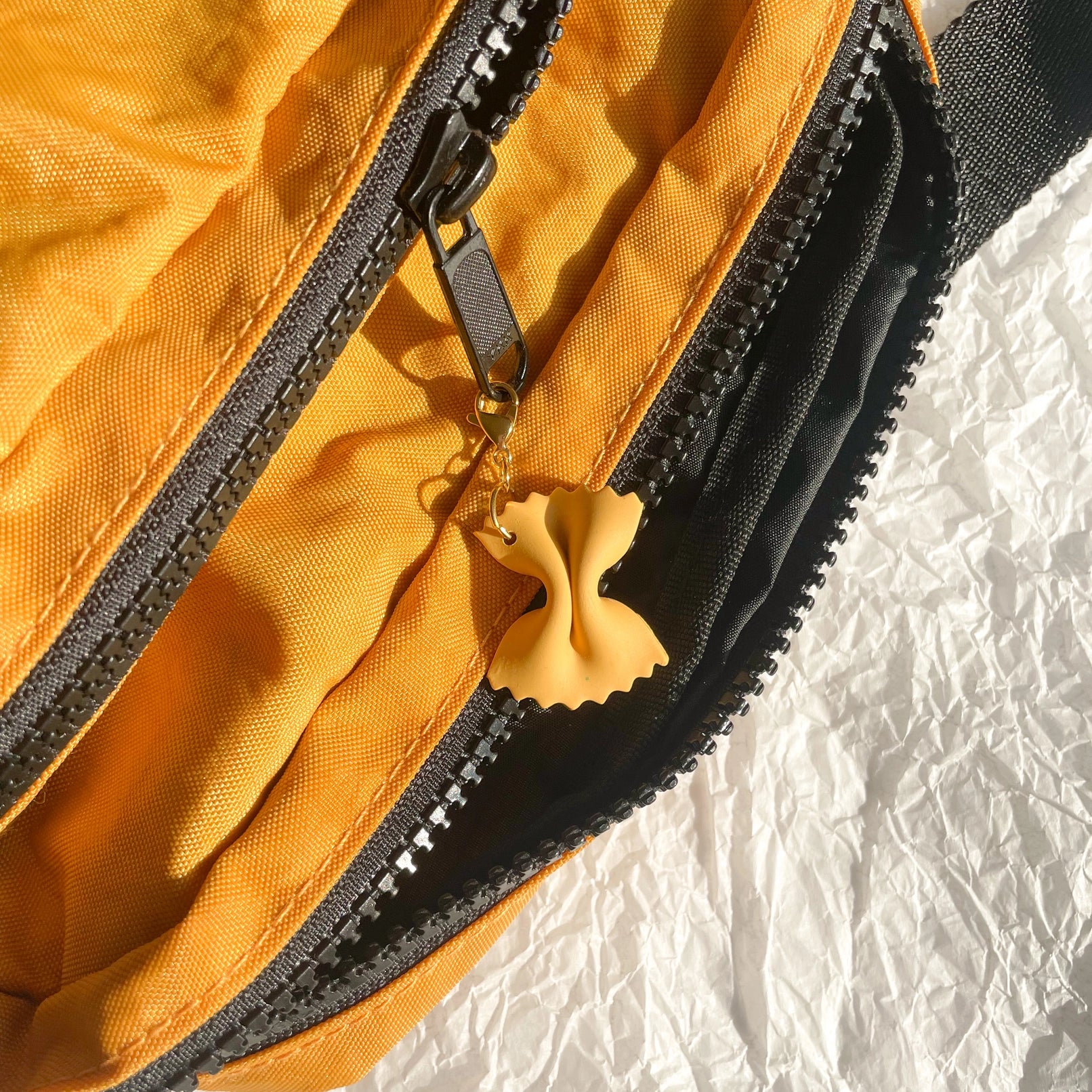Farfalle_bag_charm_73cd2fa9-a669-4f58-bb6d-fef17b84ea42.webp