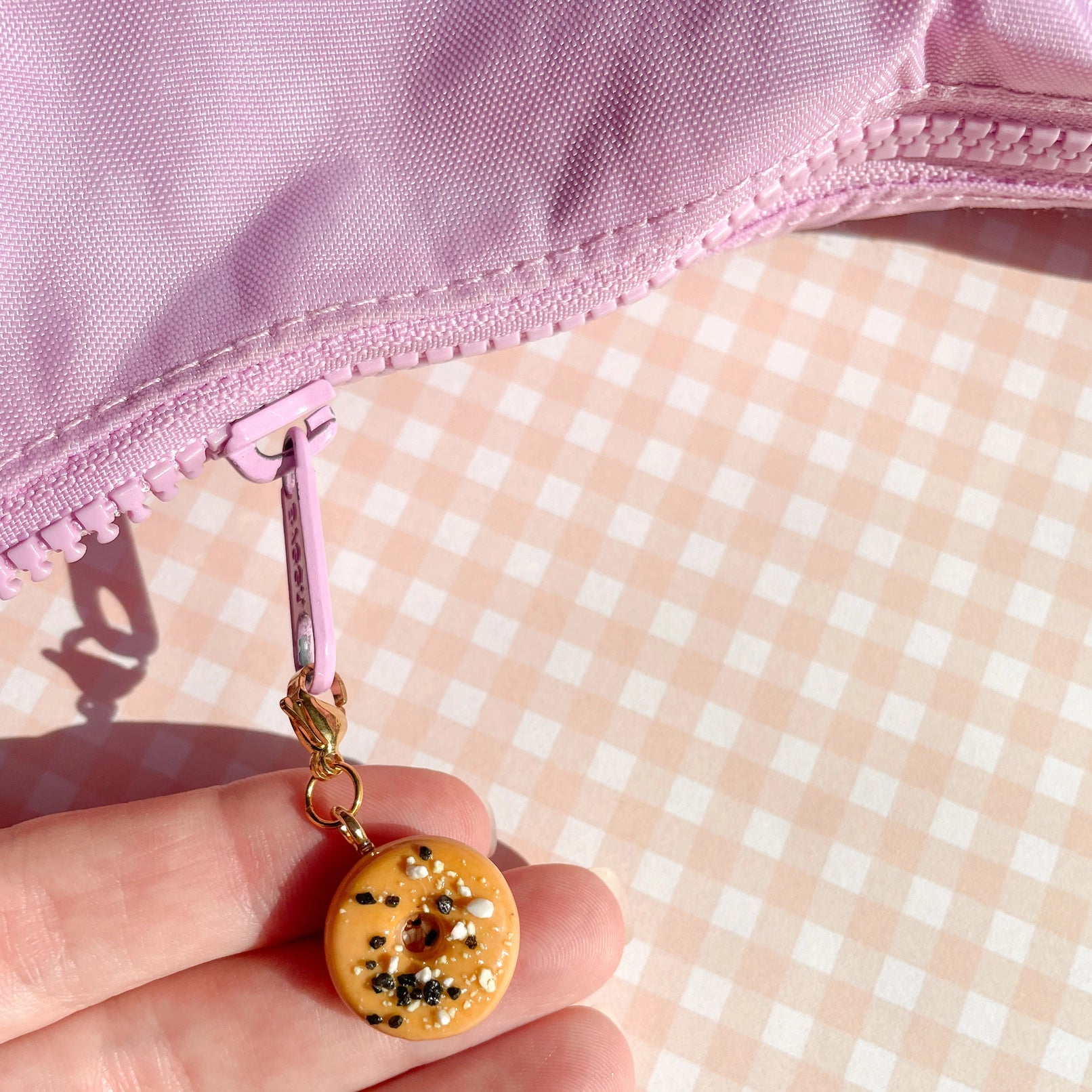 bagel_bag_charm_3_ff551f36-5d1f-4015-a6af-a0a1c61c0562.webp