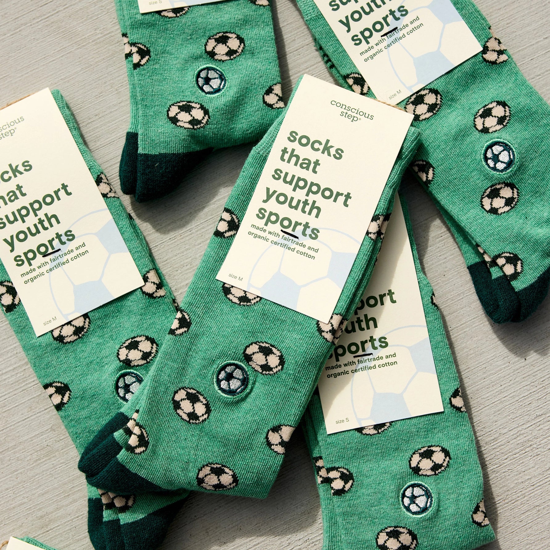 Socks That Support Youth Sports | Soccer balls