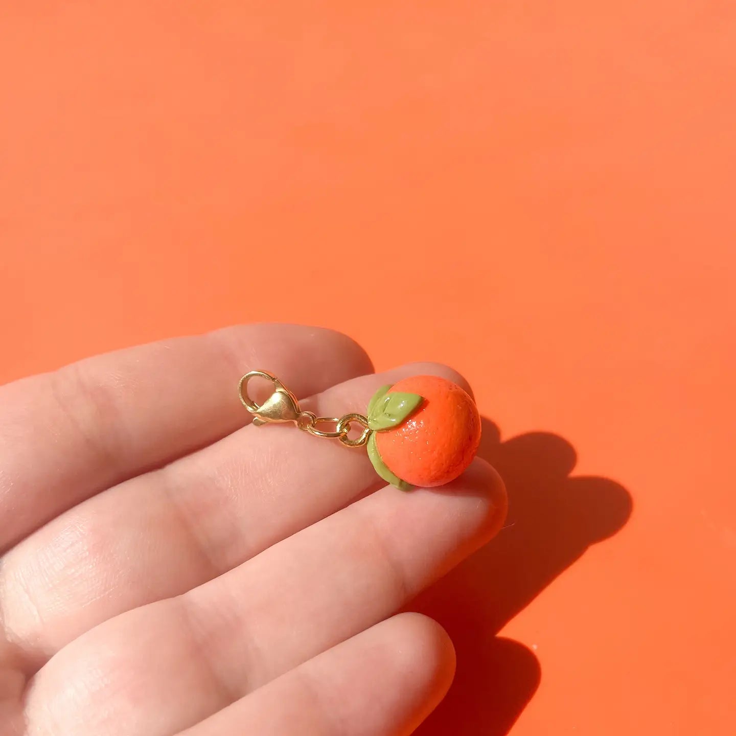 tangerine_bag_charm_2.webp